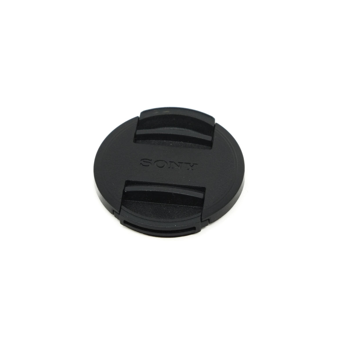 Round black cap with a logo on a white background