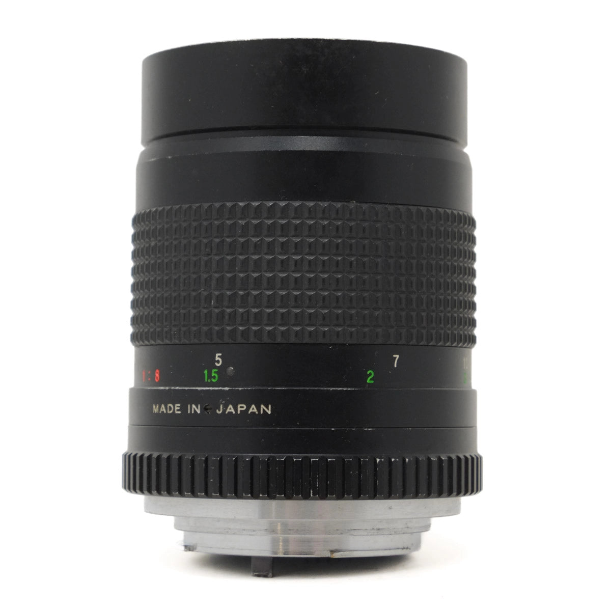 Camera lens with text 'Made in Japan' on a white background