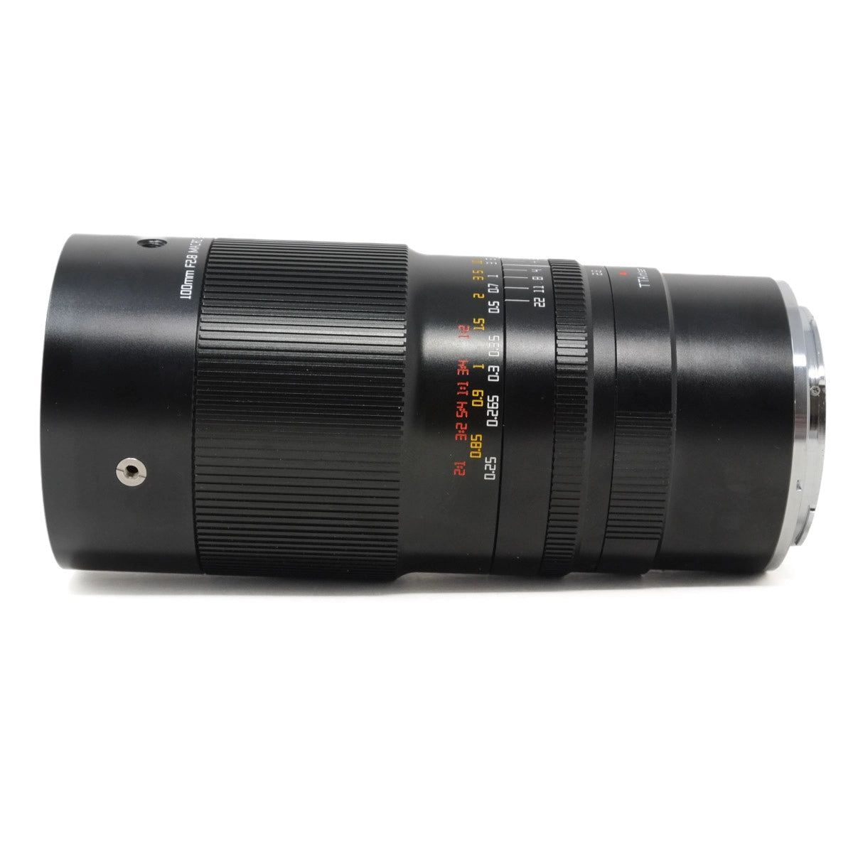 Camera lens with focus and aperture controls on a white background