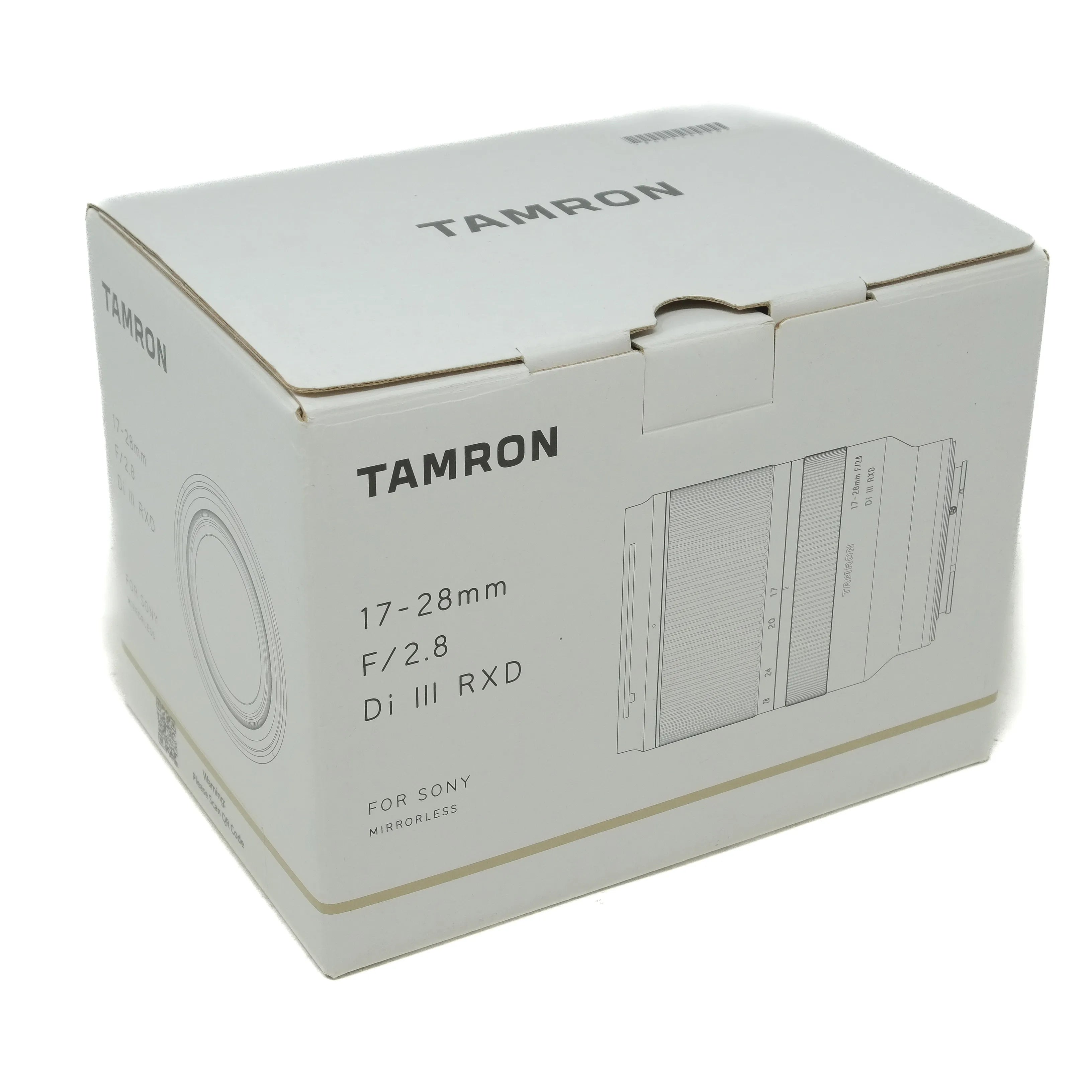 Tamron camera lens packaging box on a white background