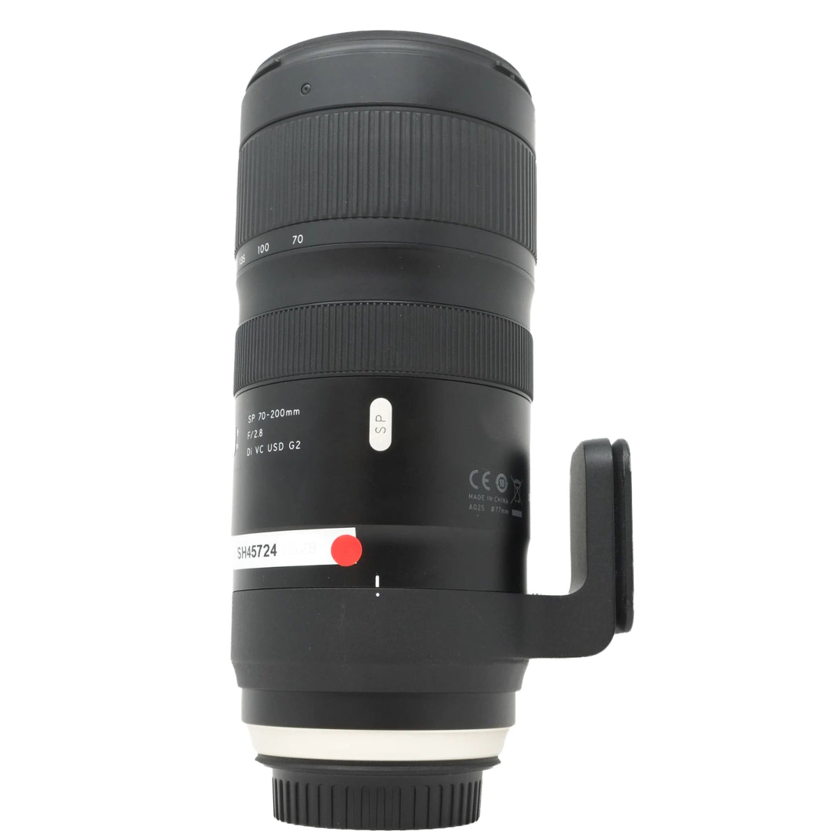 A black Tamron SP 70-200mm f/2.8 telephoto lens with a side release clip, shown against a plain white background.