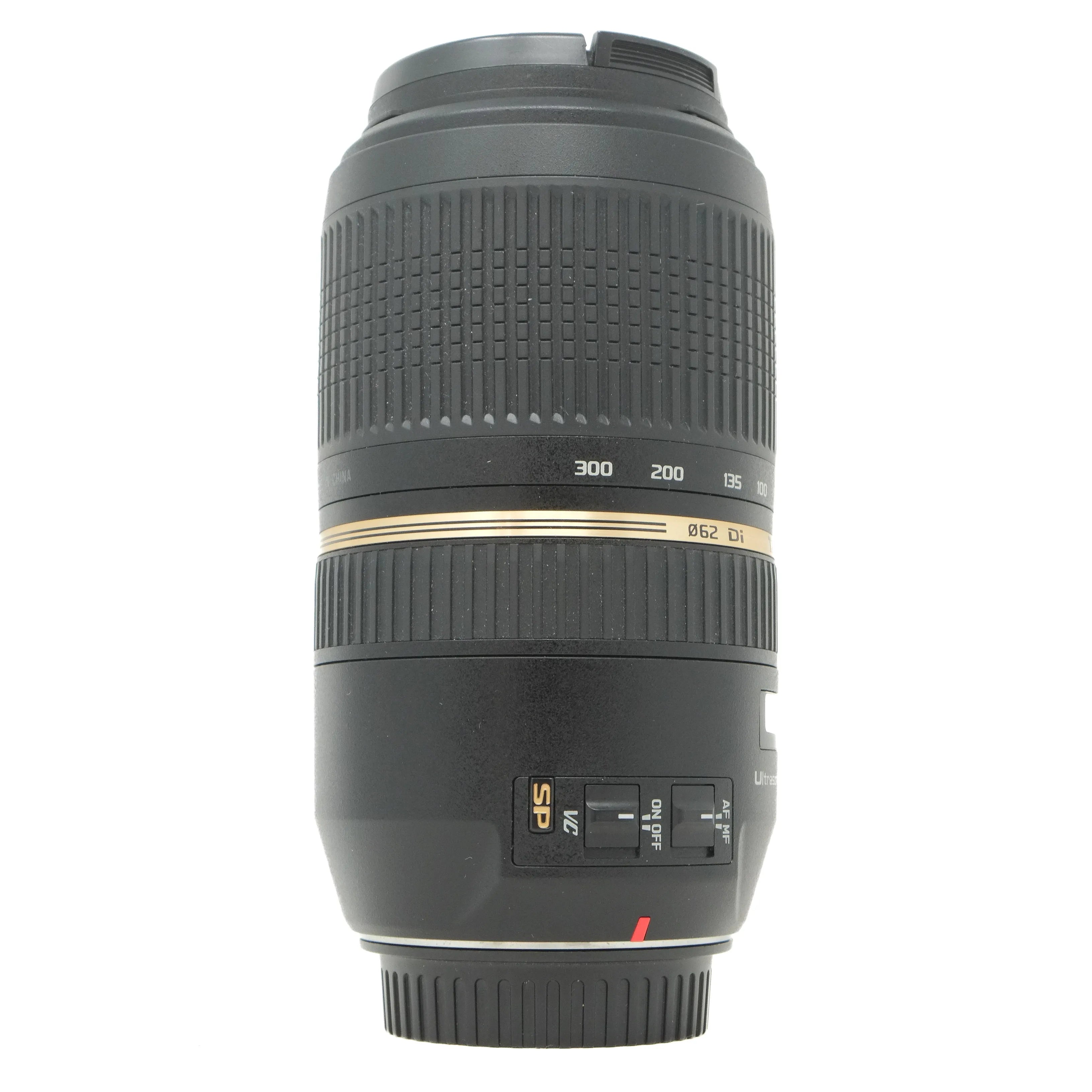 Camera lens with focus scale and brand markings on a white background