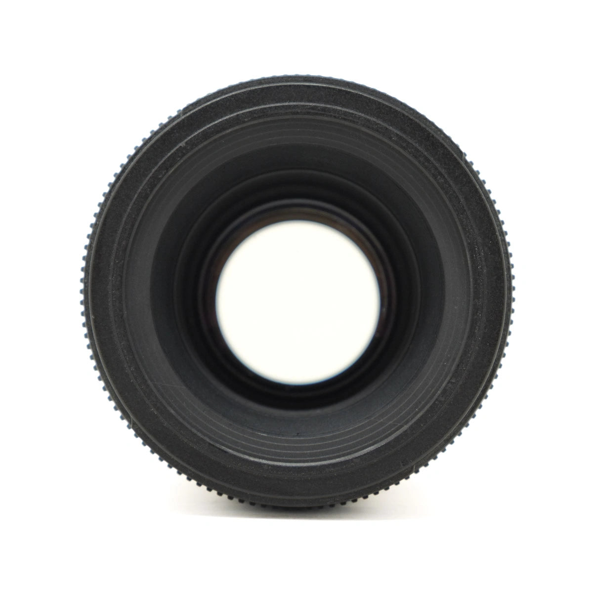 Black camera lens on a white background