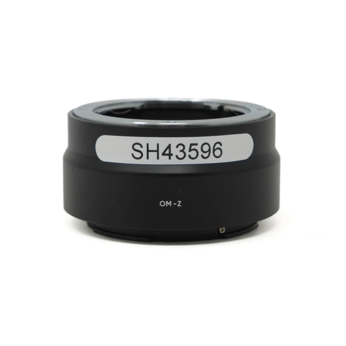 Black lens mount with 'SH43596' label on a white background