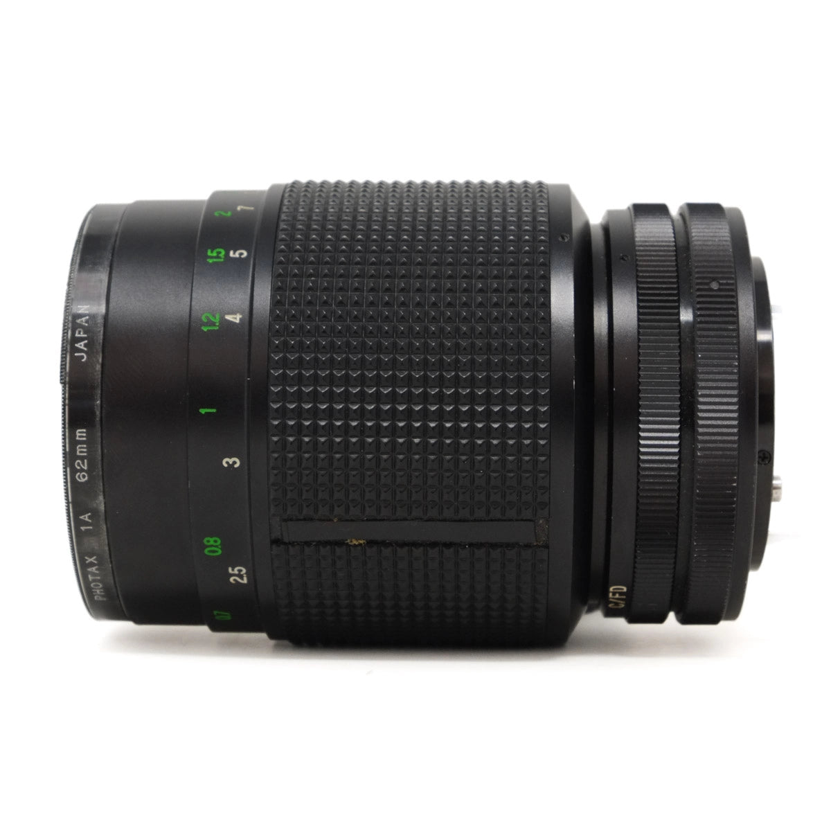Camera lens with focus scale on a white background