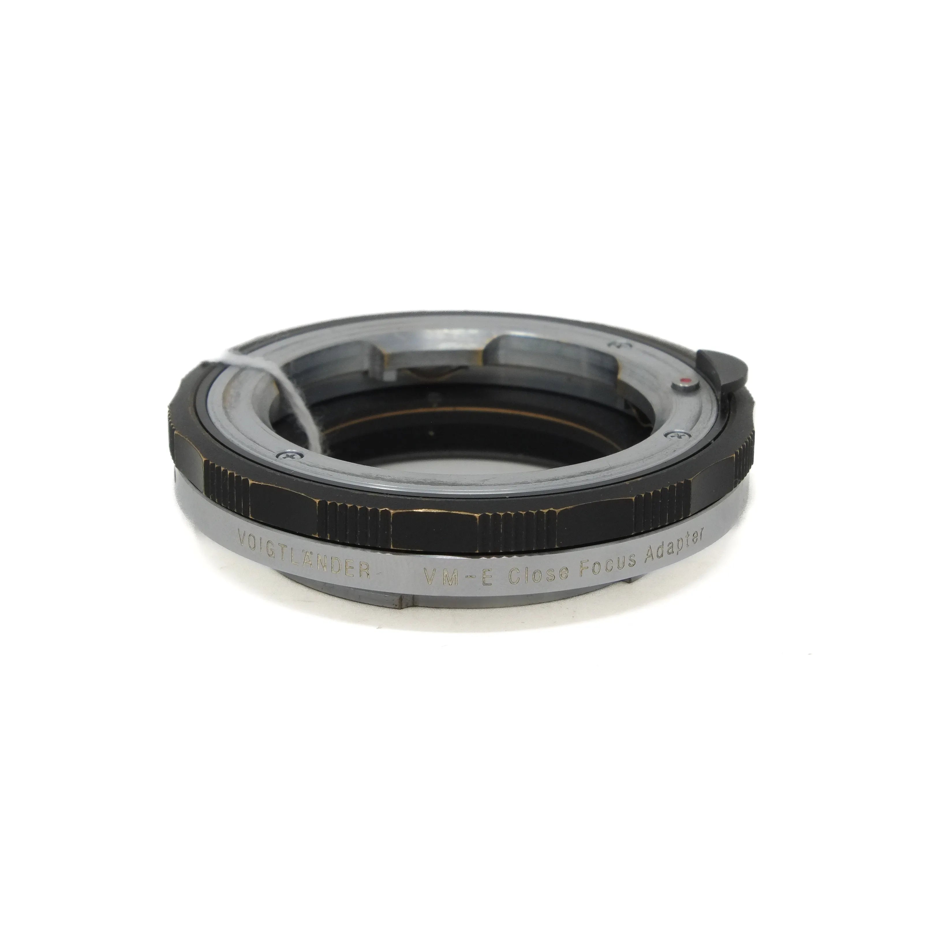 Camera lens adapter on a white background