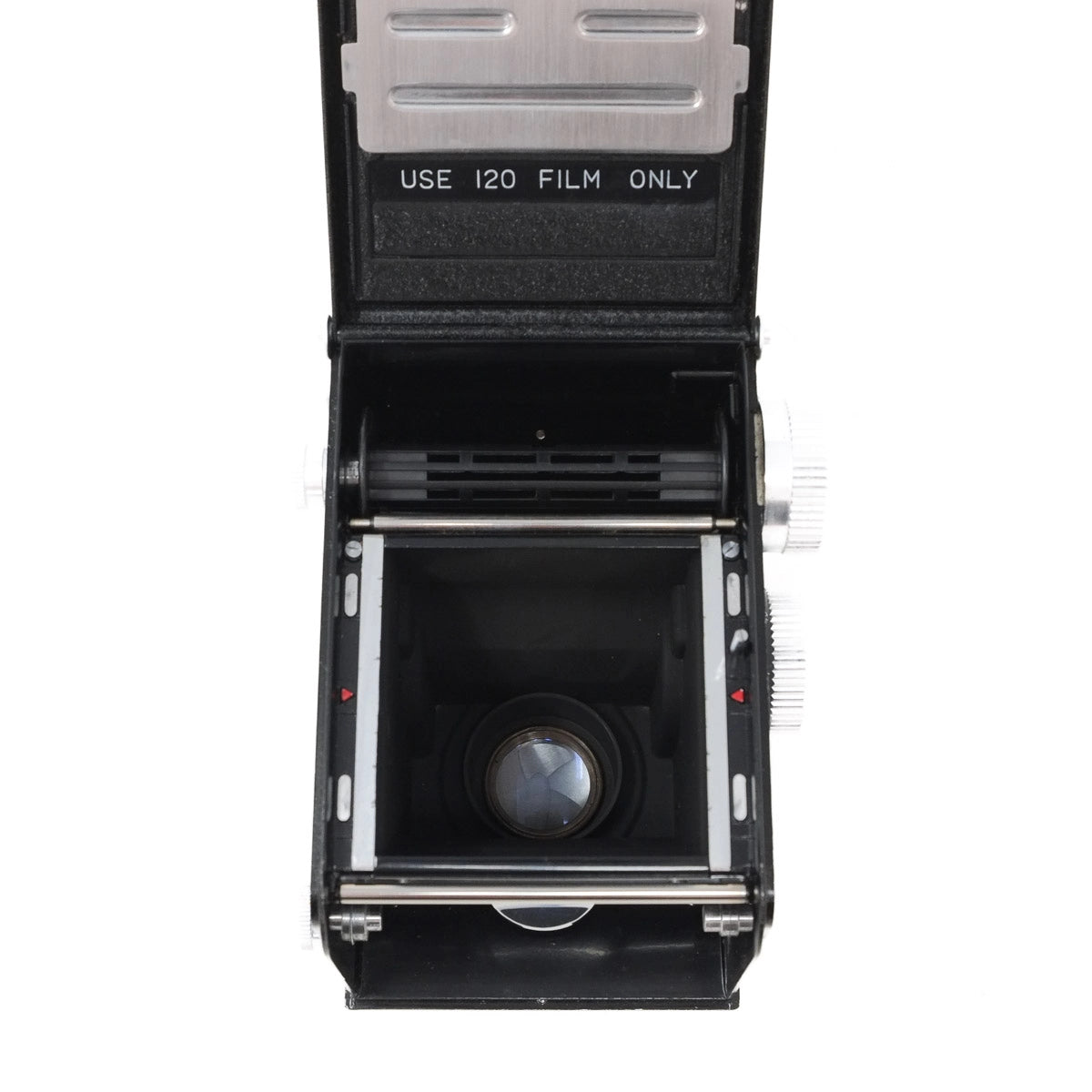Vintage camera with open lid showing film compartment on a white background