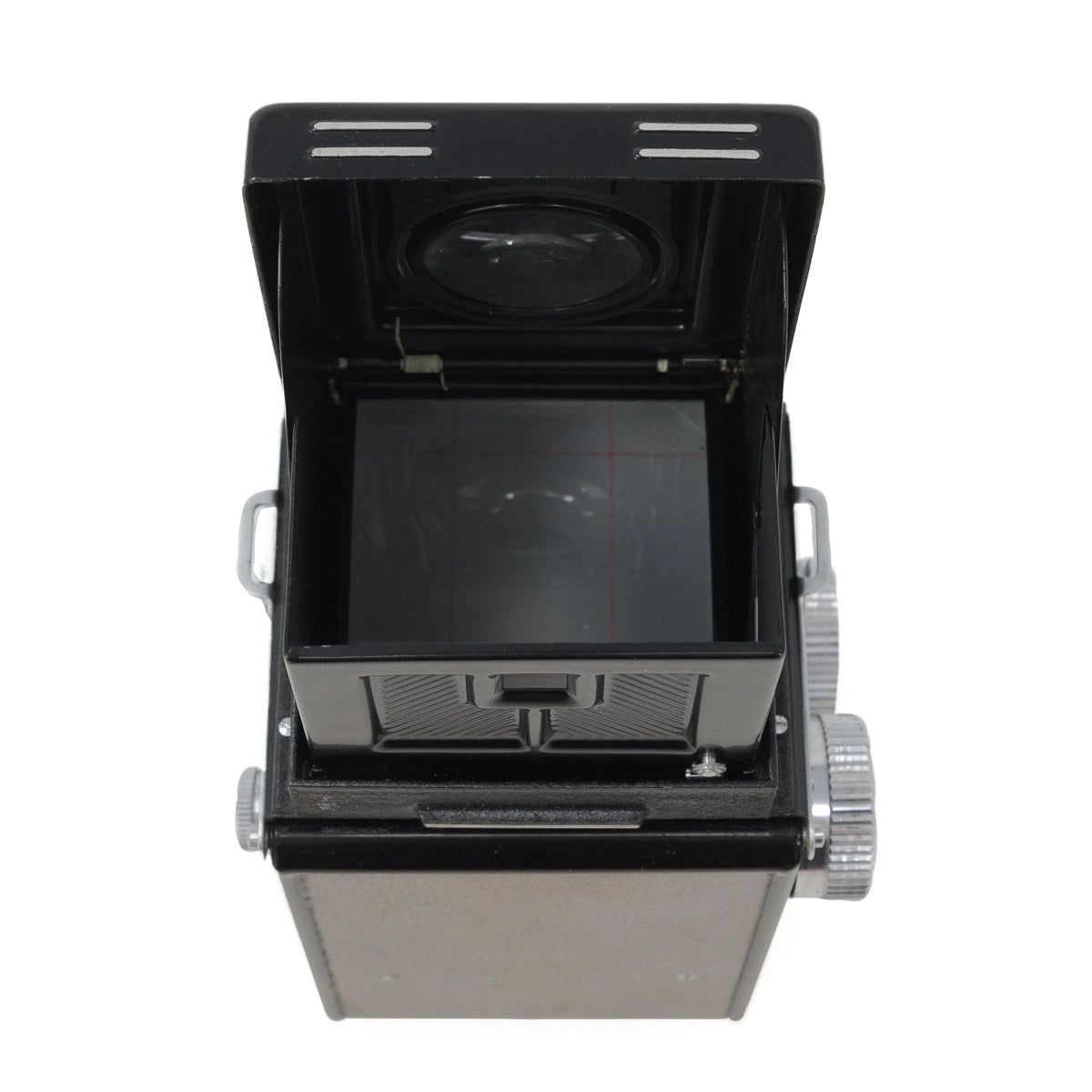 Vintage camera with open lid showing lens and viewfinder on a white background