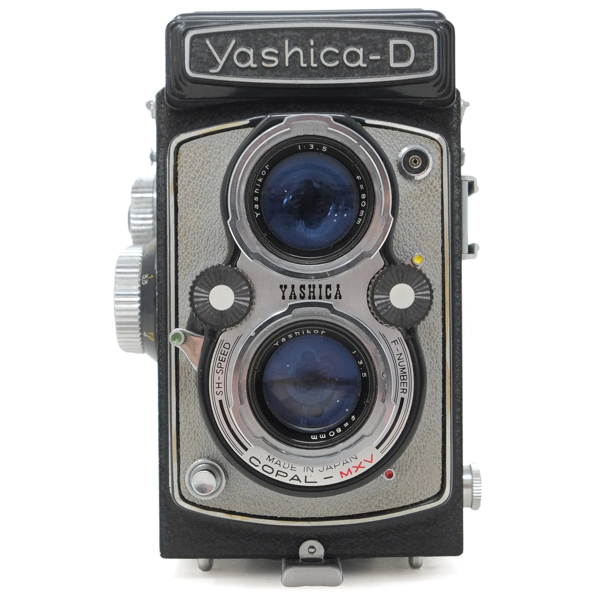 Yashica-D twin-lens reflex camera on a white background