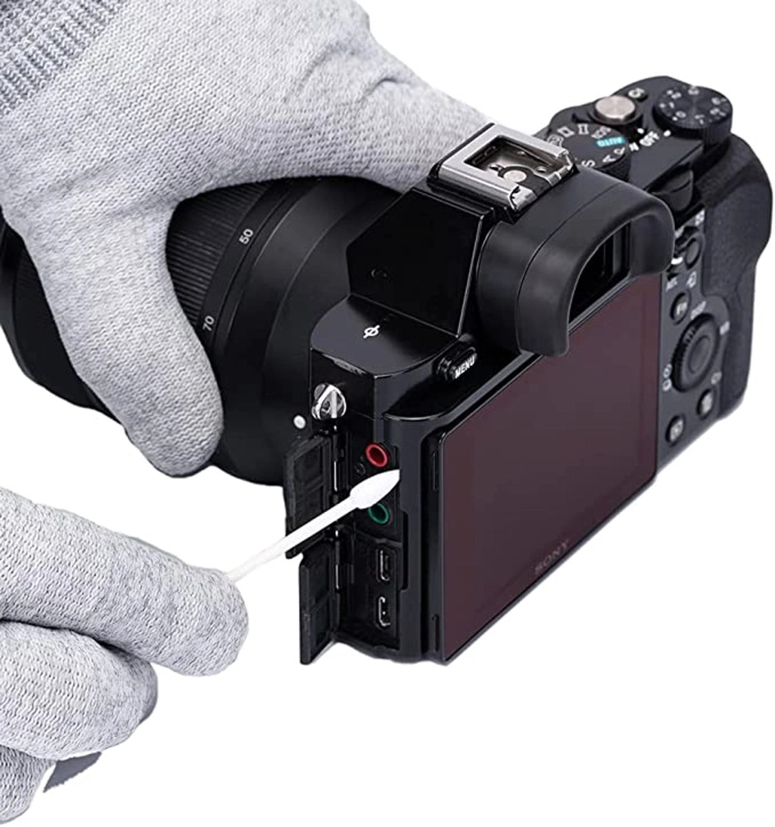 VSGO Dustless Cotton Swab swab being used to clean camera body