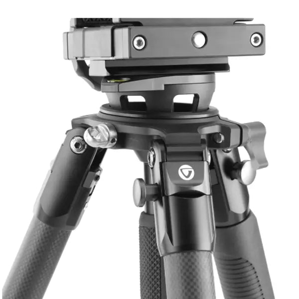 Camera tripod with adjustable head on a white background