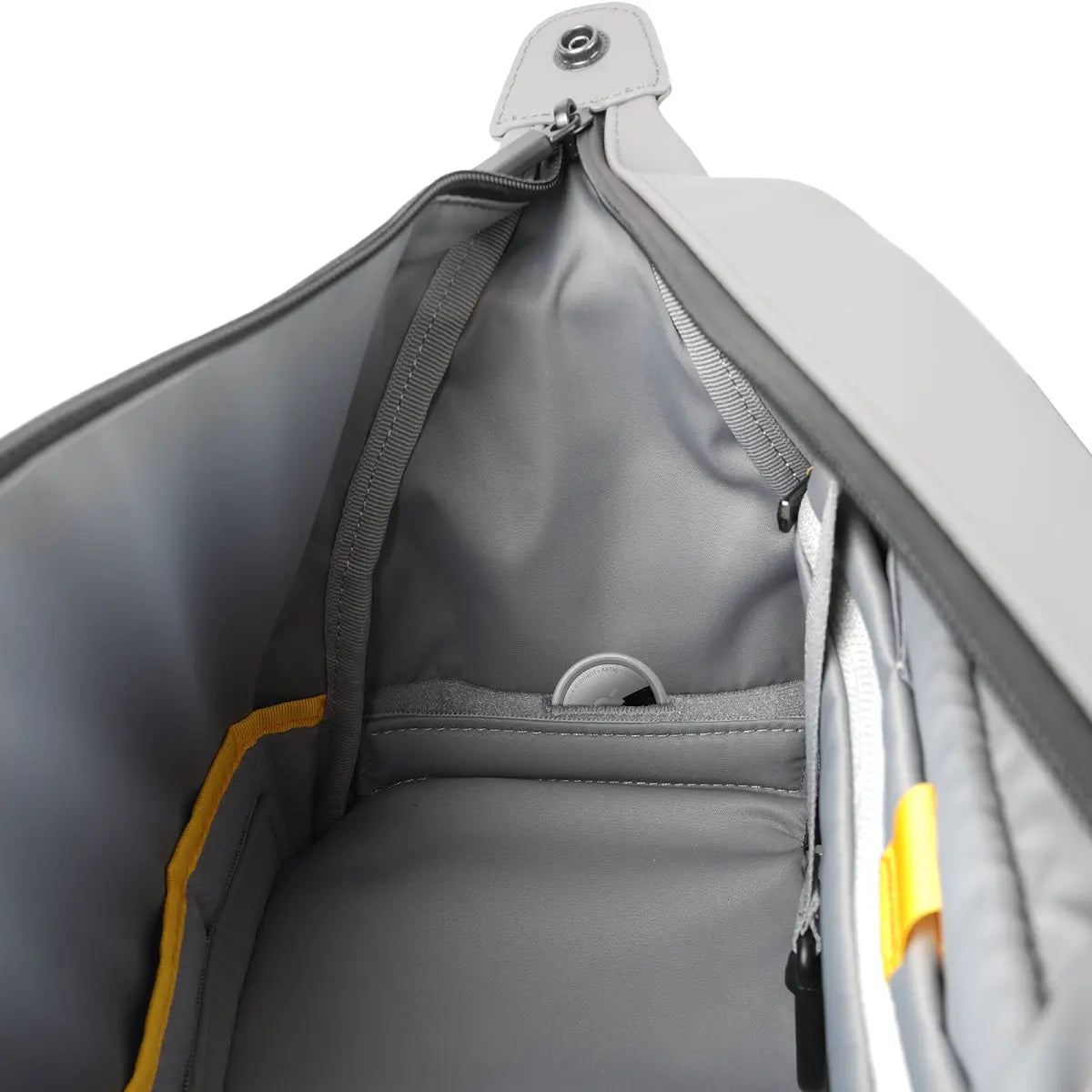 Gray backpack with a yellow zipper on a white background