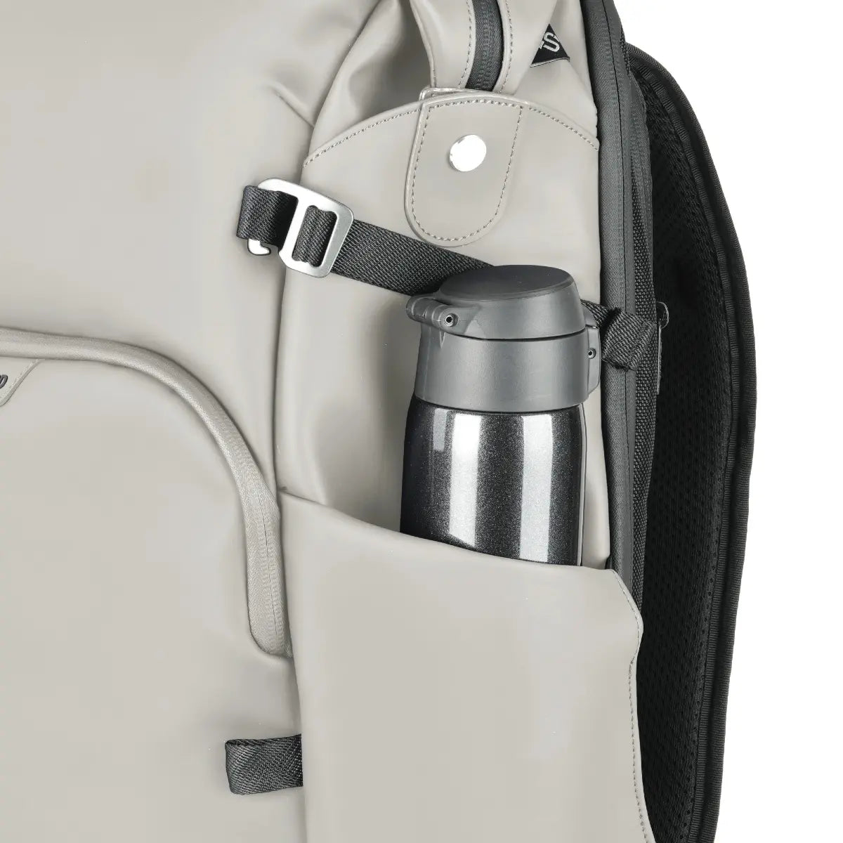 Backpack with a water bottle holder containing a silver water bottle.
