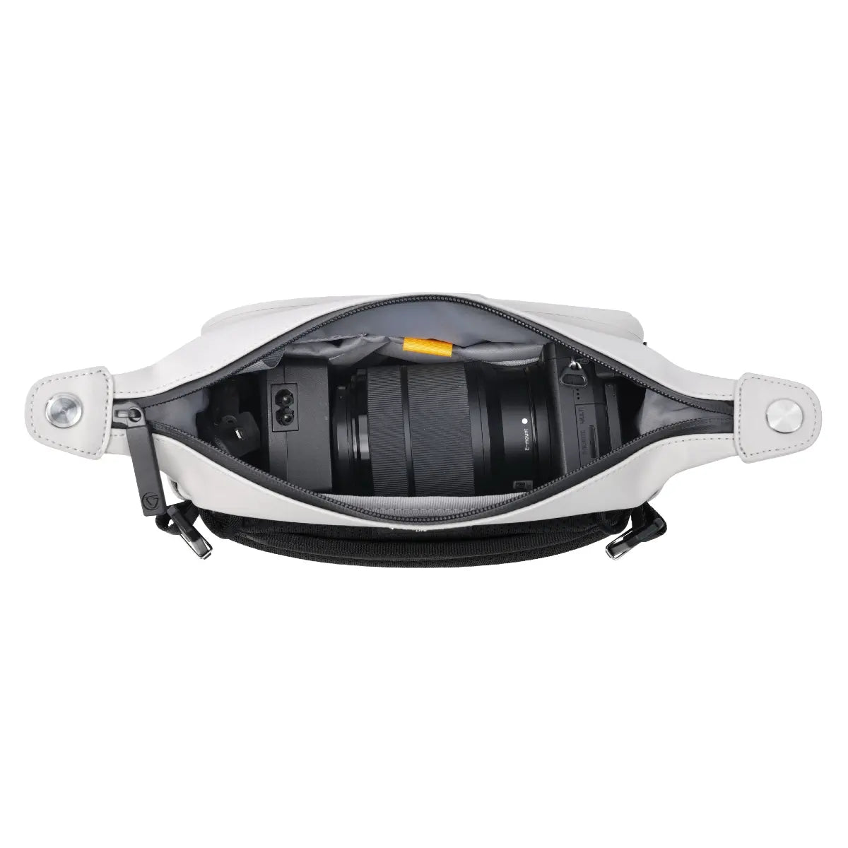 Camera bag with a camera inside on a white background