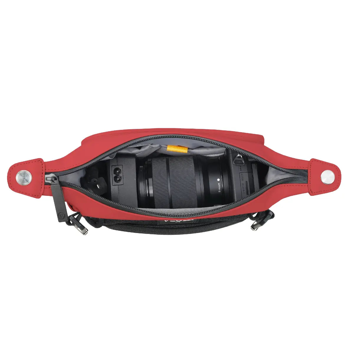 Red camera bag with a lens inside on a white background