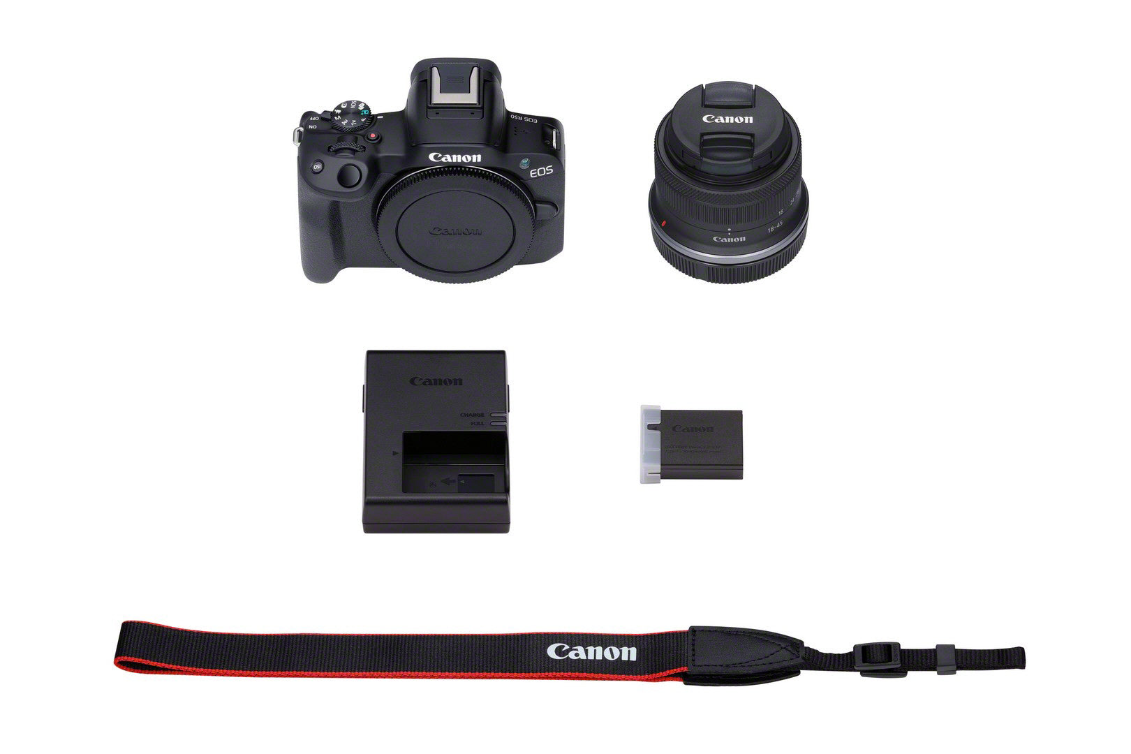 Canon EOS R50 Camera with RF-S 18-45mm Lens Kit - Product Photo 6 - Complete kit photo showing the camera body, lens, battery, battery charger and safety leash