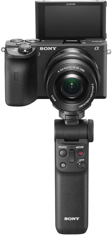 Sony Shooting Grip With Wireless Remote Commander GP-VPT2BT - Product Photo 2 - Front vierw of the camera grip with the camera attached and screen extended to illustrate the size of the grip