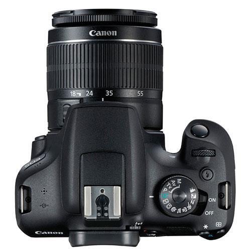 Canon EOS 2000D Digital SLR Camera with 18-55mm IS II Lens - Product Photo 3 - Top down view of the camera showing the flash connection port, control dial and general controls