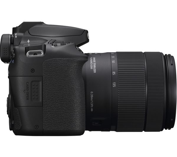 Canon EOS 90D Digital SLR Camera with 18-135mm IS USM Lens - Product Photo 3 - Side view of the camera with the SD card port visible and lens attached