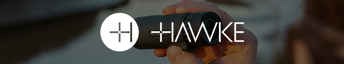 Hawke monoculars collection banner - Hawke logo on a transulcant background image of a monocular held in hand by a lake