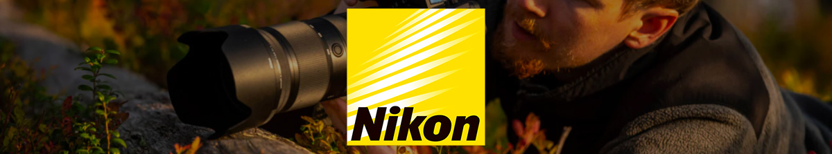 Nikon Collection Background Image - Photographer in the woodland
