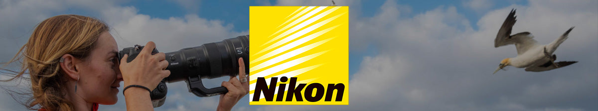 Nikon Camera Lenses Collection Banner Image - Photographer capturing a bird in flight