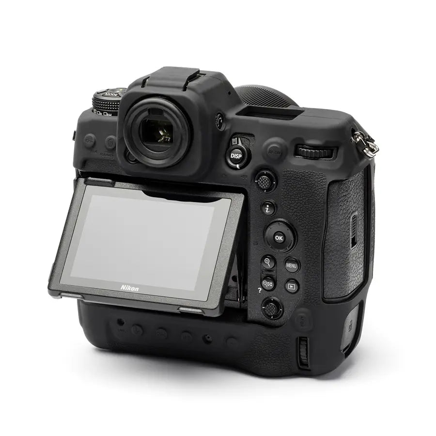 Nikon camera body with screen up on a white background