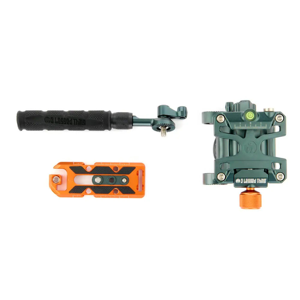 Camera accessories including a black handle, green and orange mount on a white background
