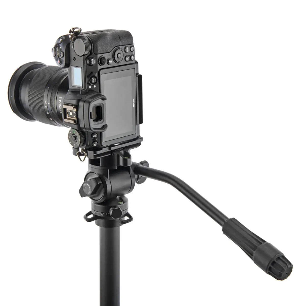 Camera mounted on a tripod with a white background