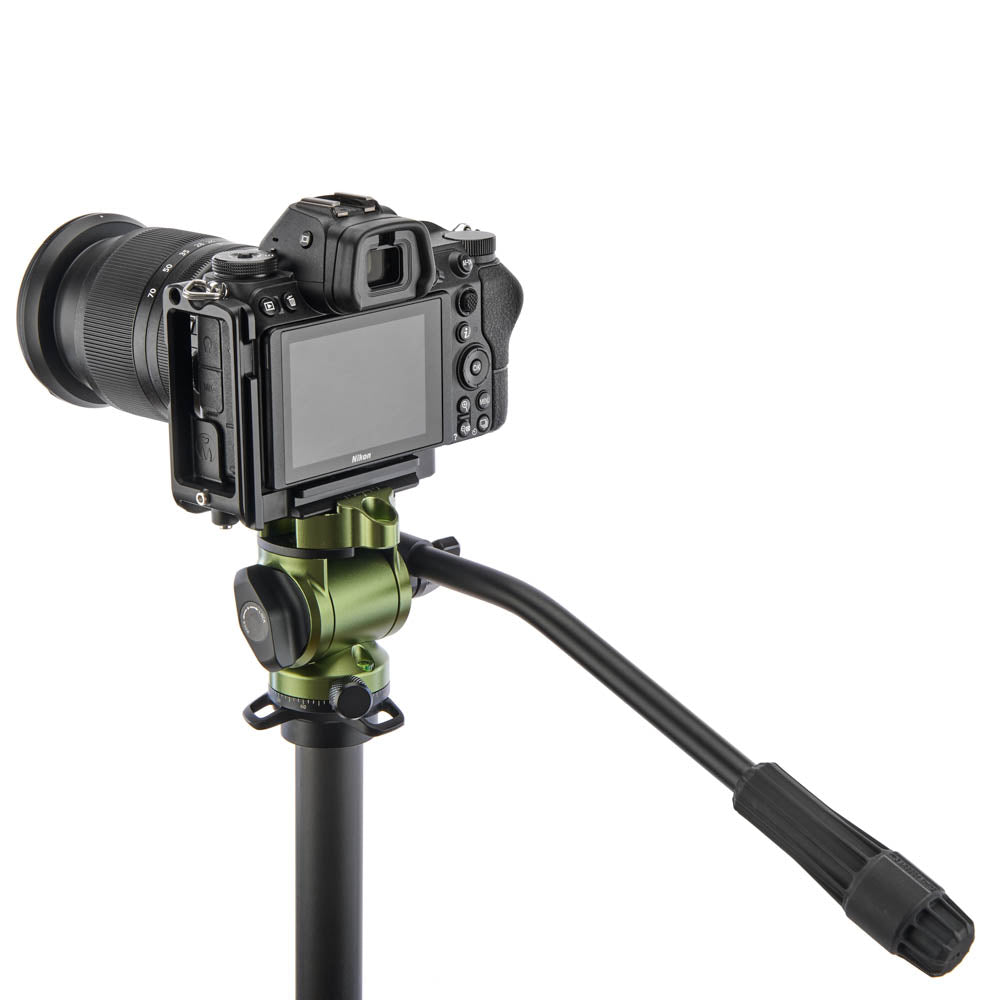 Camera on a tripod with a white background