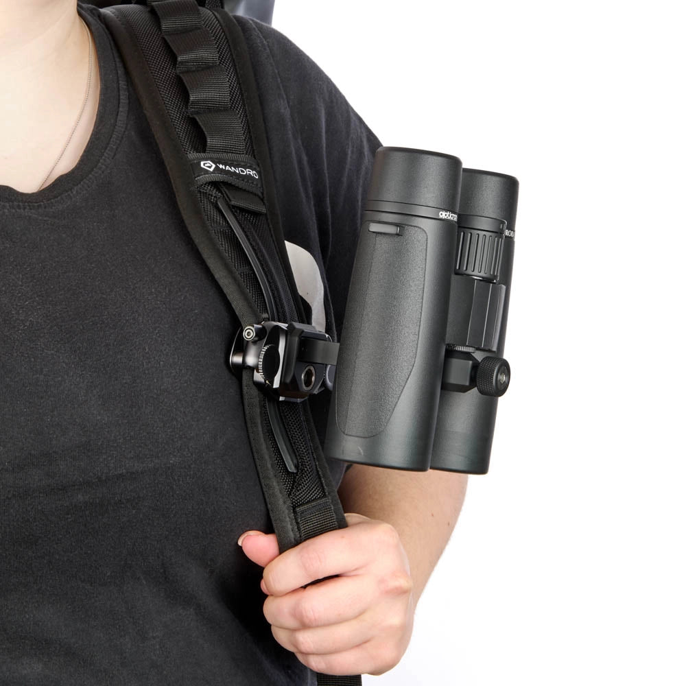 3 Legged Thing Binoz Binocular Mount black with binoculars attached on camera bag