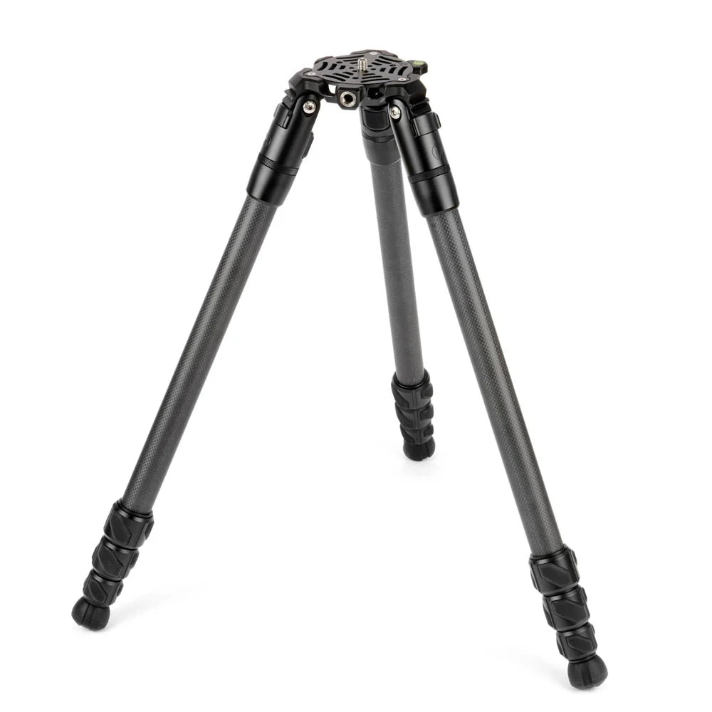 A black carbon fiber tripod with a quick-release head, fully extended on a clean white background.