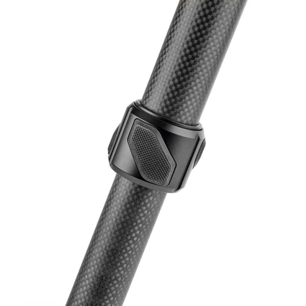 Close-up of a black carbon fiber pole with a textured black metal clamp or connector, shown against a plain white background.