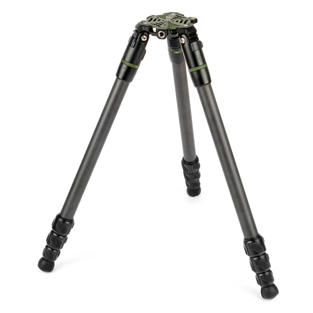 A black carbon fiber tripod with olive green accents on the joints and head, shown fully extended on a clean white background.