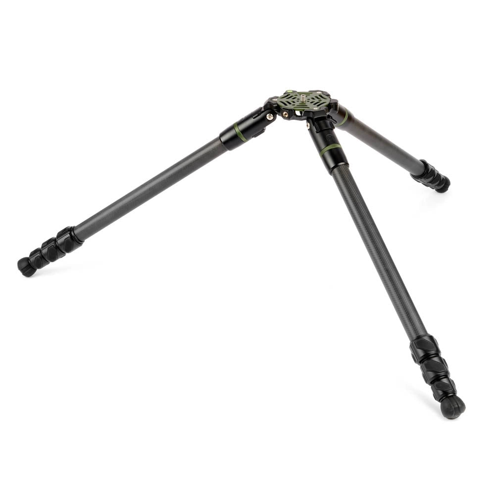 A black tripod with olive green accents on the head and joints, shown fully extended on a clean white background.