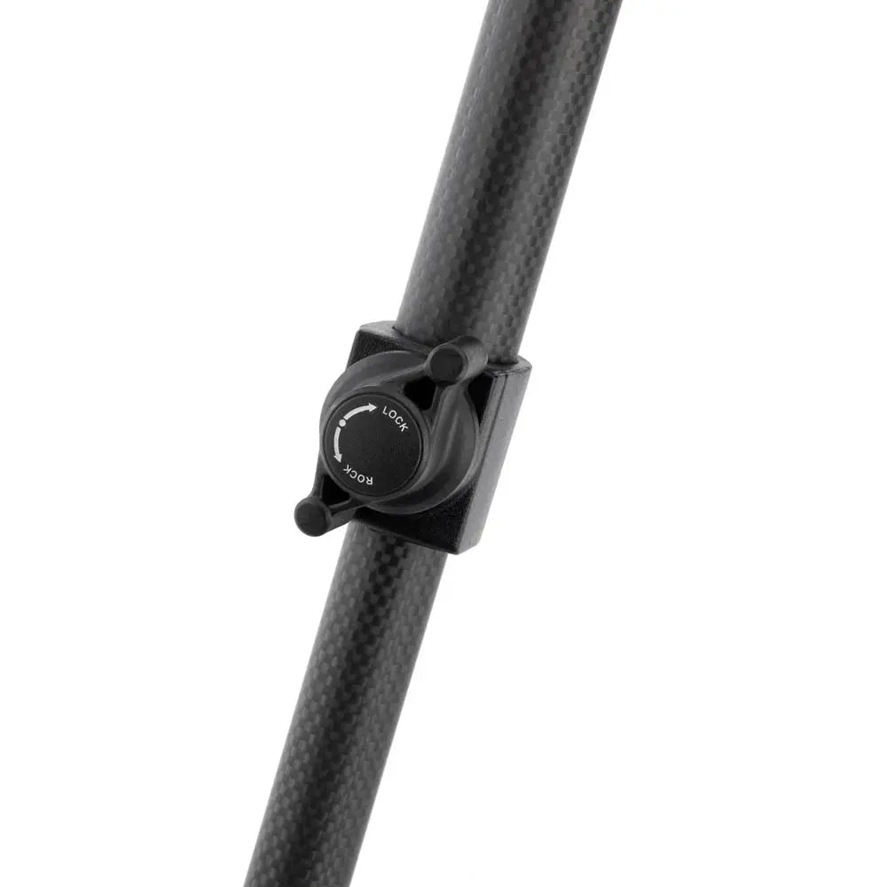 Carbon fiber rod with a black clamp on a white background