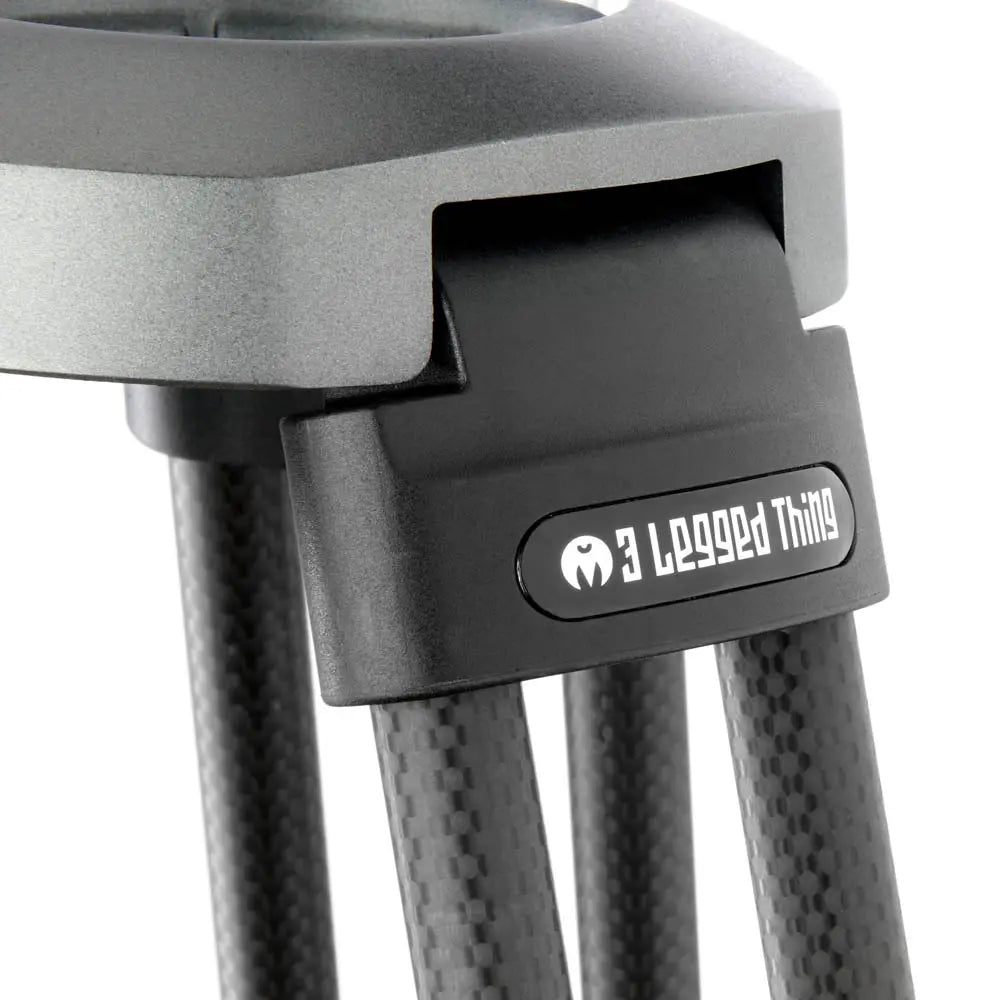 Close-up of a tripod with '3 Legged Thing' branding on a white background