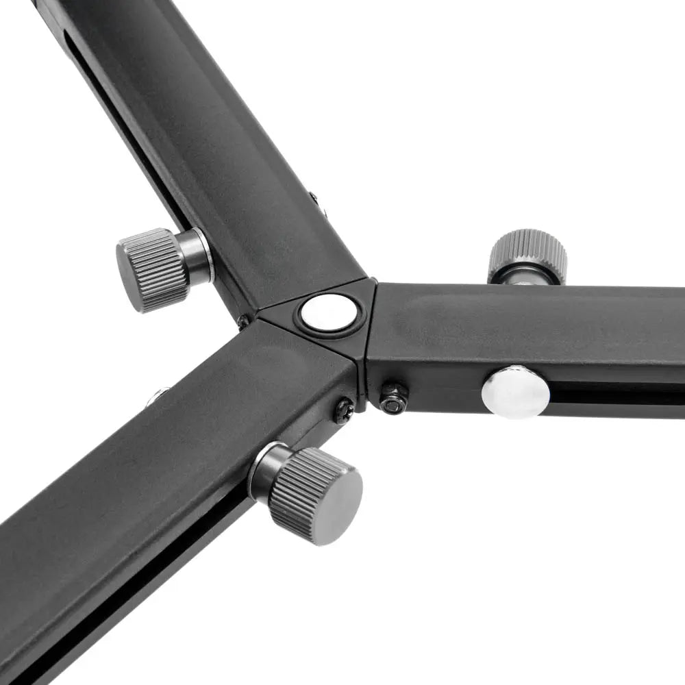 Close-up of a metal stand with adjustable joints on a white background