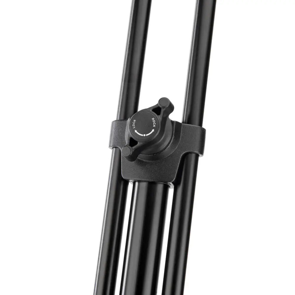 Black metal tripod with adjustable head on a white background