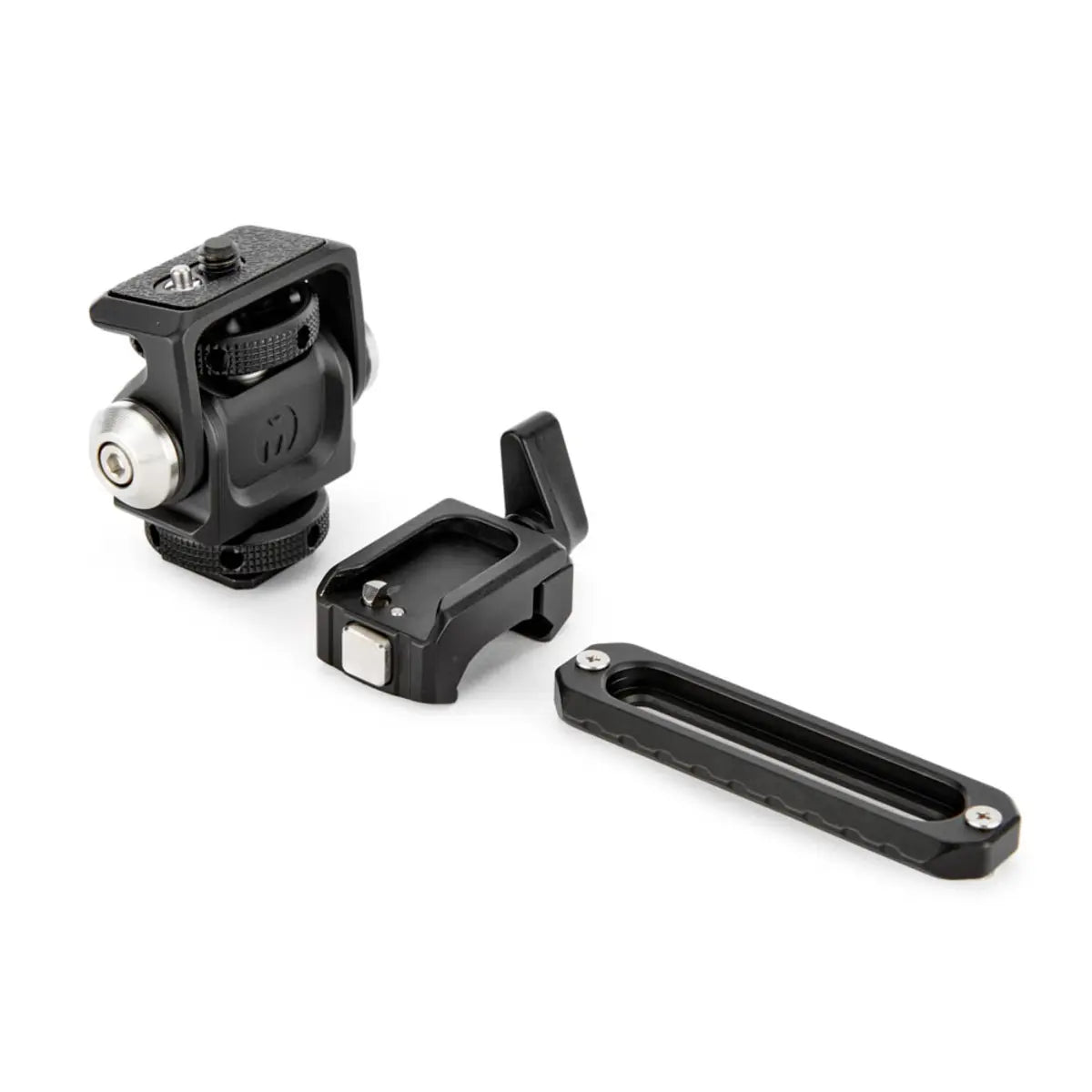 Three black camera accessories on a white background