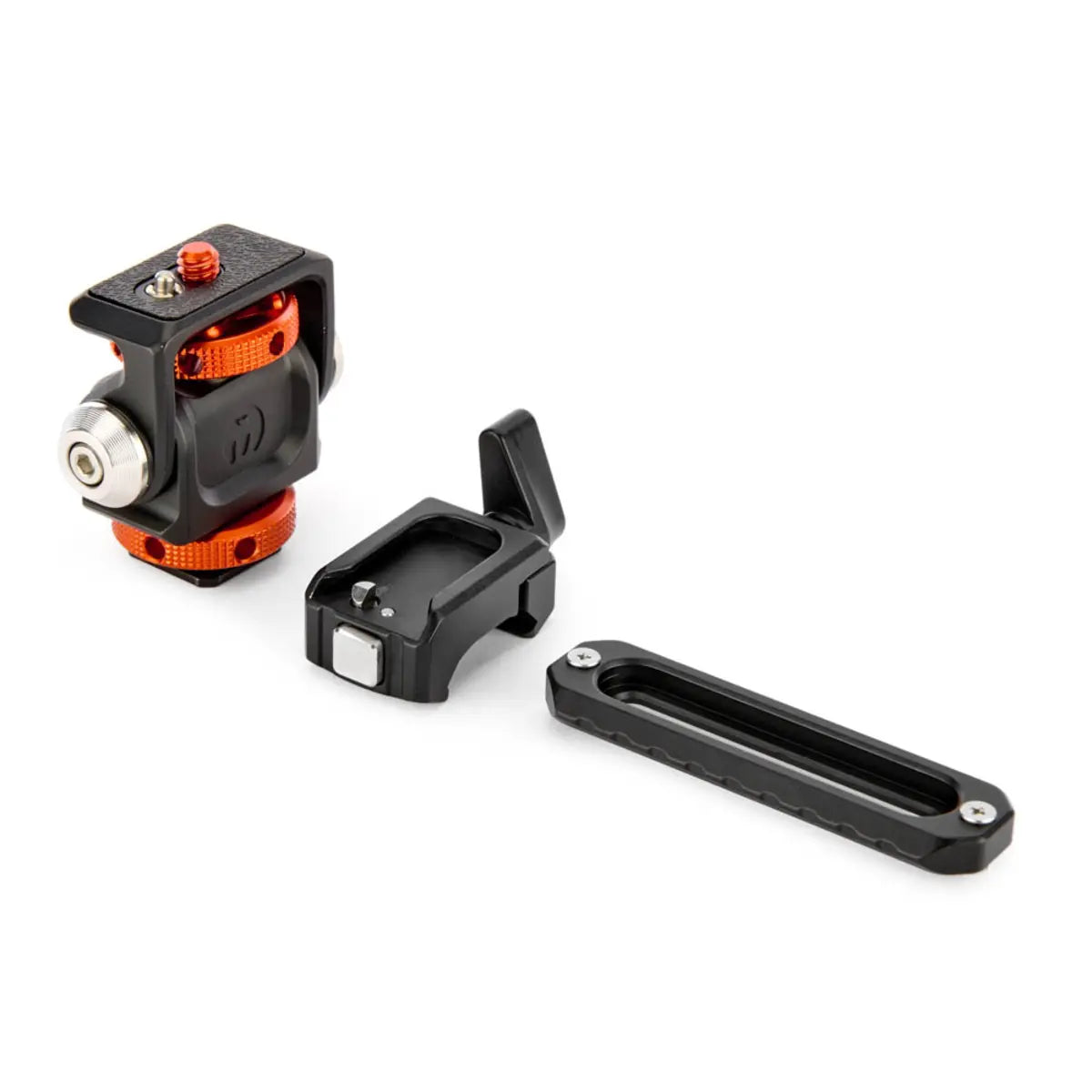 Camera accessories including a ball head and two clamps on a white background