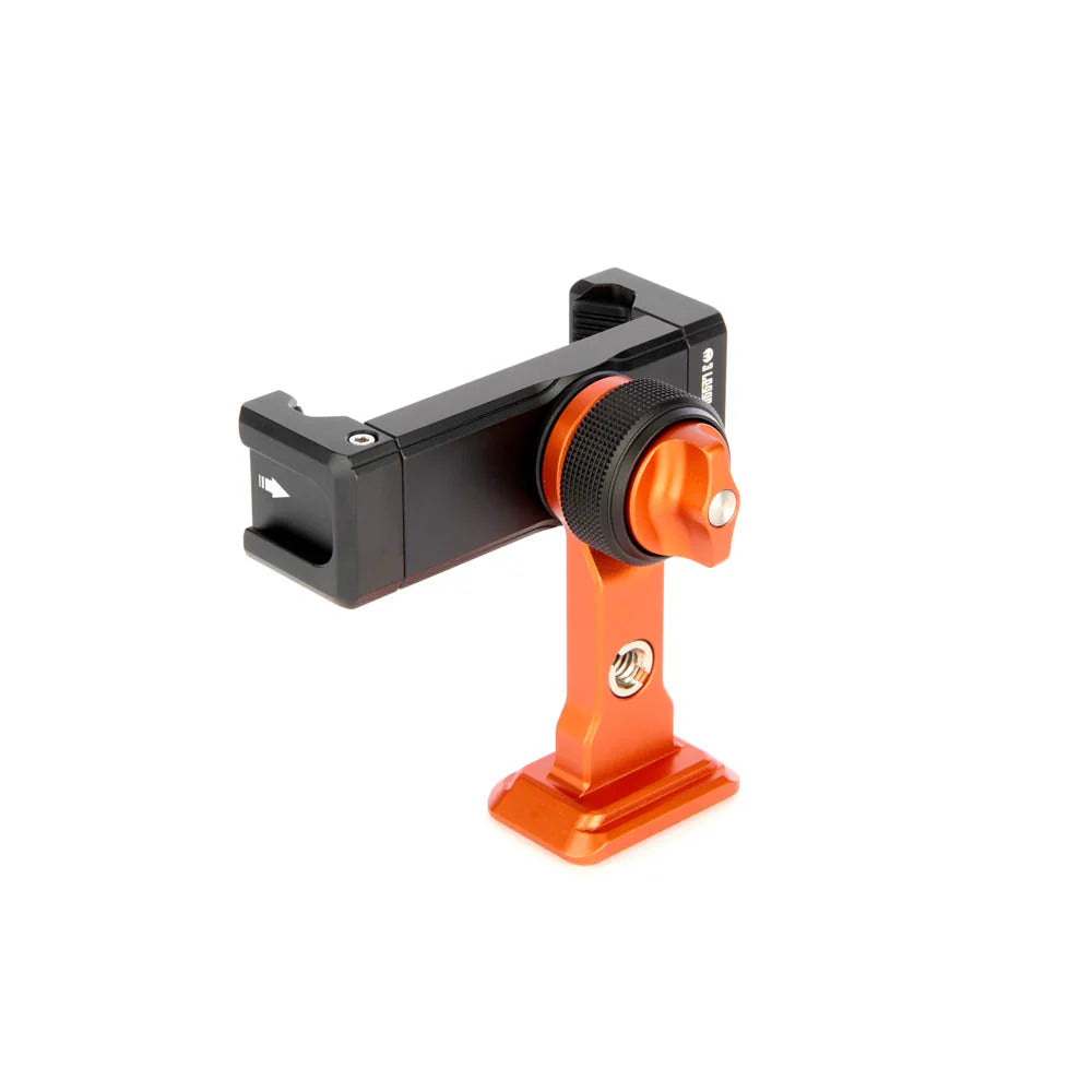 An orange and black phone mount holding, shown from a back angle against a clean white background.