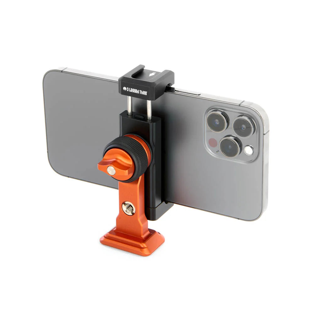 An orange and black phone mount with a smartphone attached, shown on a clean white background.