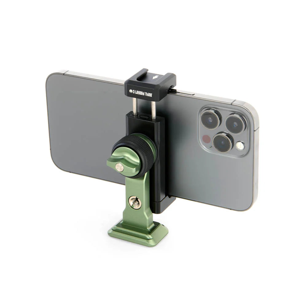 A green and black phone mounting bracket holding a gray smartphone, shown on a clean white background.
