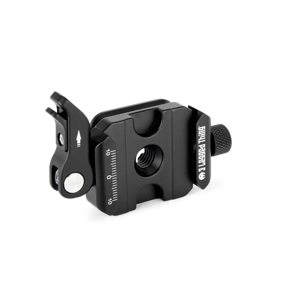Black camera accessory with measurement scale on a white background