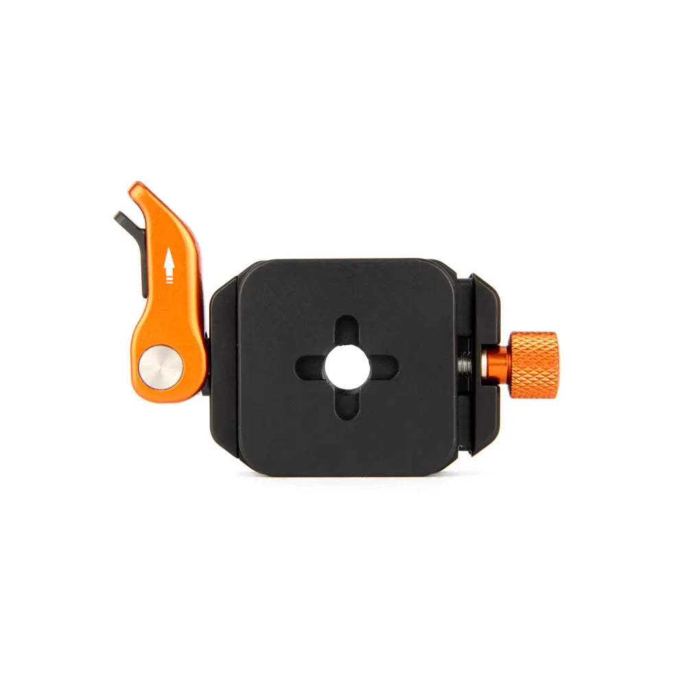 Black and orange mechanical component on a white background