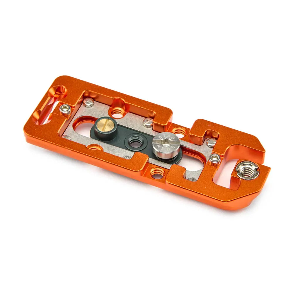 Orange metal component with screws on a white background