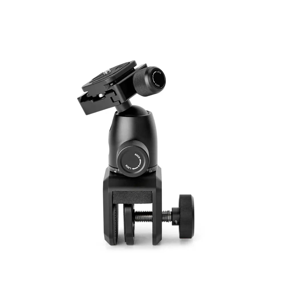 Black camera tripod head on a white background