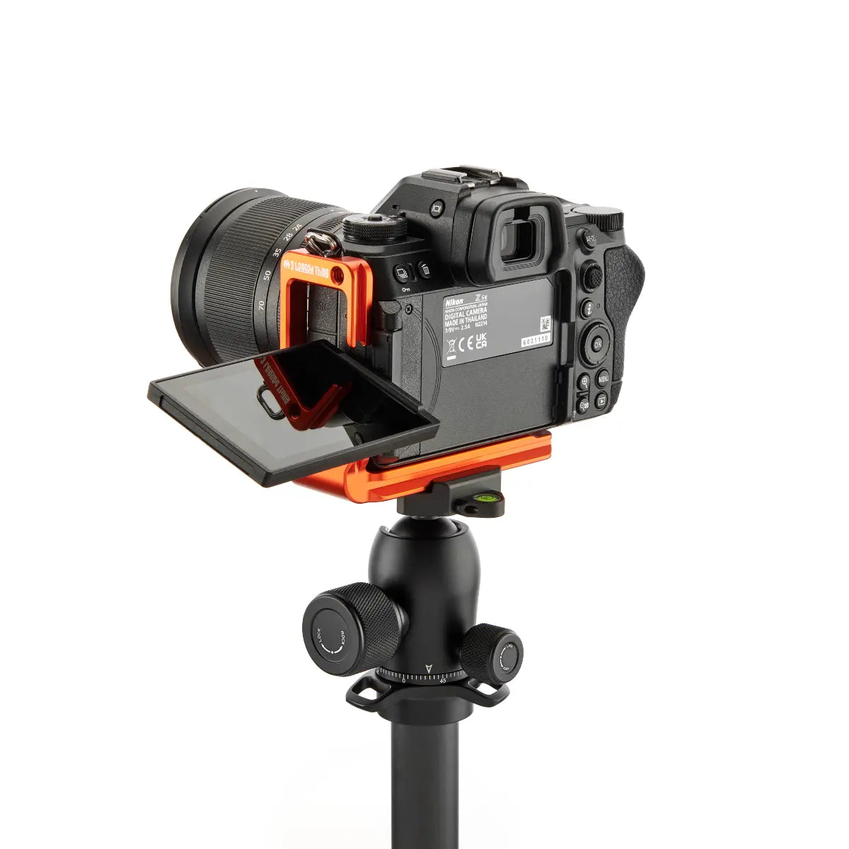 Camera with a mounted lens on a white background