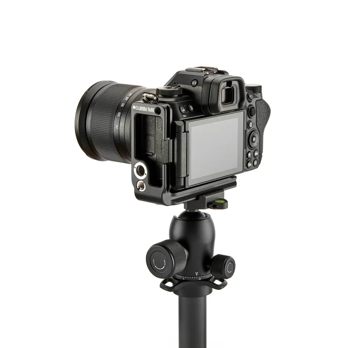 Camera on a tripod with a white background